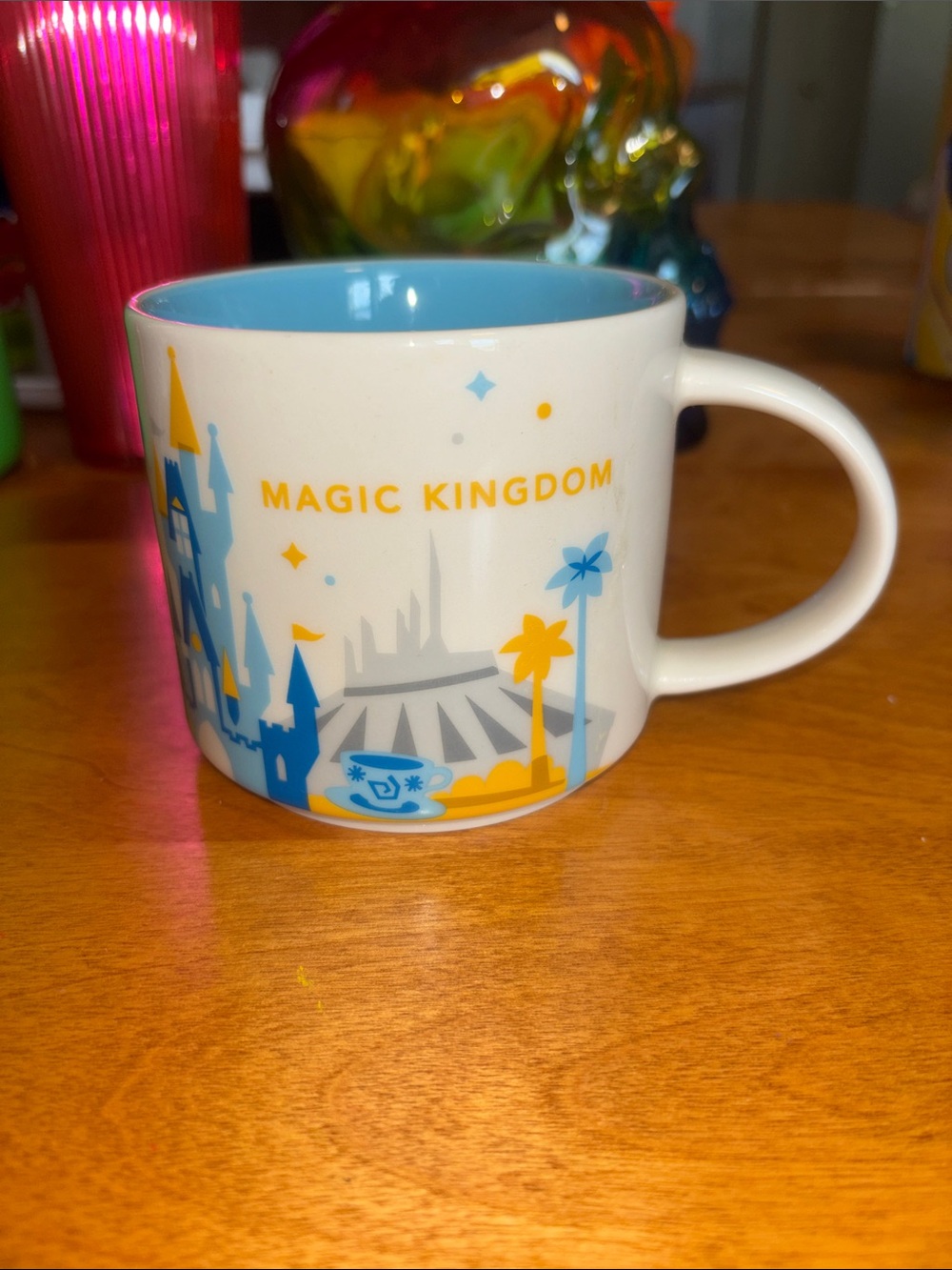 Starbucks Magic Kingdom White Mug with Blue and Yellow Graphics